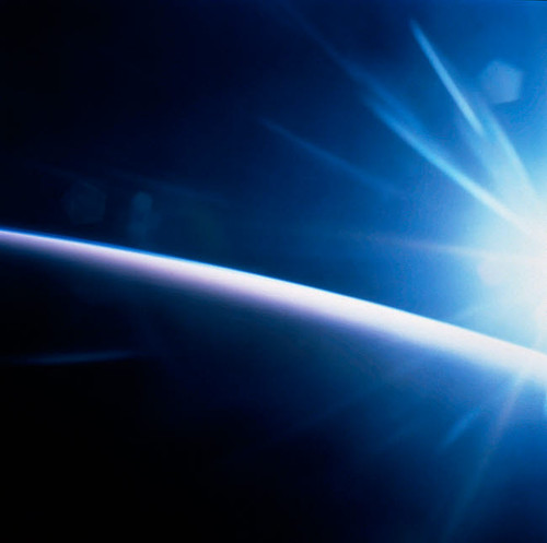 The Sun shining on planet Earth Poster Print by Stocktrek Images - Item # VARPSTSTK200565S