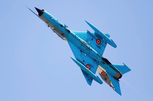 A Romanian Air Force MiG-21 Lancer over Romania Poster Print by Anton Balakchiev/Stocktrek Images - Item # VARPSTABA100100M