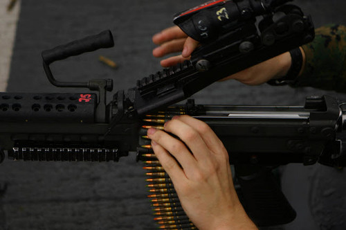 An M-249 Squad Automatic Weapons is loaded with 556mm rounds Poster Print by Stocktrek Images - Item # VARPSTSTK103299M