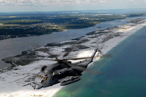 An MH-53 Pave Low flies over the coastline of Florida Poster Print by Stocktrek Images - Item # VARPSTSTK102797M