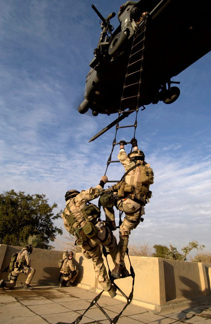 Air Force pararescuemen are extracted by an HH-60G Pave Hawk helicopter Poster Print by Stocktrek Images - Item # VARPSTSTK101043M