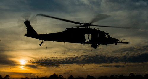 A US Army UH-60 Black Hawk leaves the drop zone Poster Print by Stocktrek Images - Item # VARPSTSTK108846M