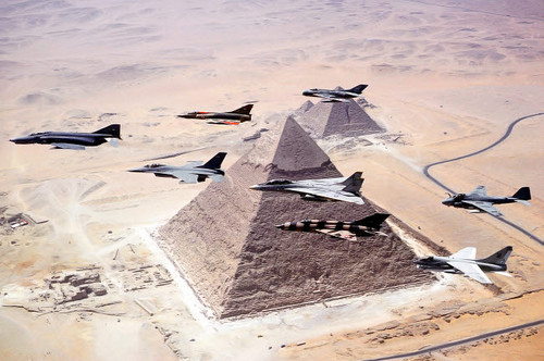 A formation of Egyptian and US Navy aircraft fly over one of the Great Pyramids near Cairo Poster Print by Stocktrek Images - Item # VARPSTSTK101546M