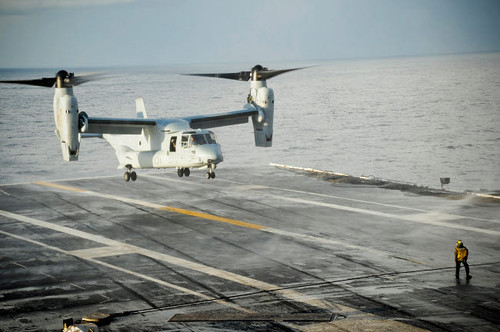 An MV-22 Osprey lands on the flight deck of USS George HW Bush Poster Print by Stocktrek Images - Item # VARPSTSTK105845M An MV-22 Osprey lands on the flight deck of USS George HW Bush Poster Print by Stocktrek Images - Item # VARPSTSTK105845M