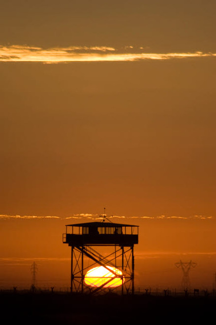 Guard tower at sunset Poster Print by Terry Moore/Stocktrek Images - Item # VARPSTTMO100019M