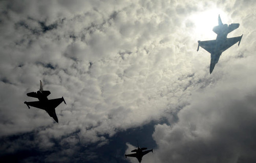 Three F-16 Fighting Falcons fly in formation over Guam Poster Print by Stocktrek Images - Item # VARPSTSTK102960M