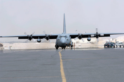 Ground crews prepare a C-130 Hercules for take off Poster Print by Stocktrek Images - Item # VARPSTSTK102435M