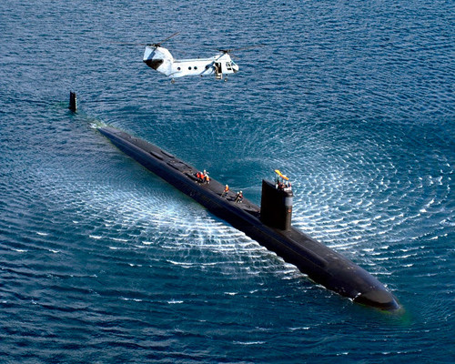 A CH-46 Sea Knight hovers above an attack submarine Poster Print by Stocktrek Images - Item # VARPSTSTK101365M
