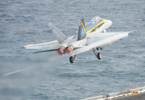 An F/A-18C Hornet taking off Poster Print by Stocktrek Images - Item # VARPSTSTK107767M