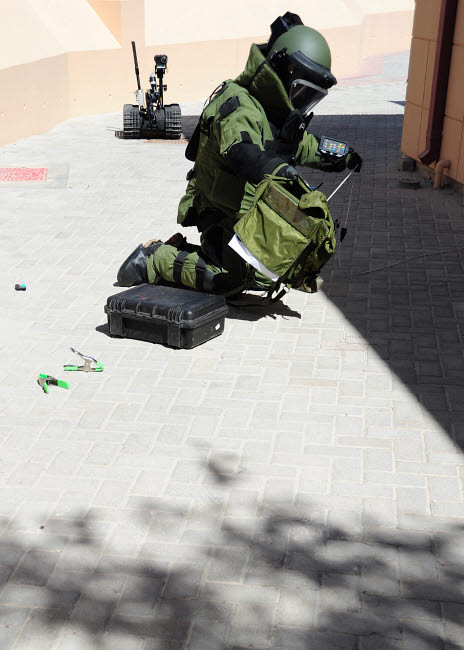 Explosive ordnance disposal technician investigates an IED Poster Print by Stocktrek Images - Item # VARPSTSTK105827M