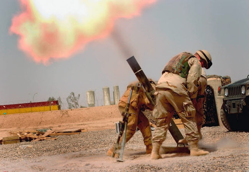 Specialist fires a 120mm M120 mortar Poster Print by Stocktrek Images - Item # VARPSTSTK100054M