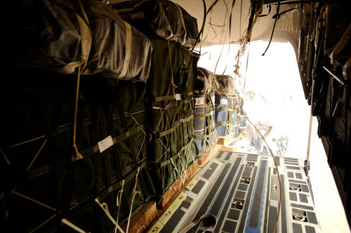 Container delivery system bundles drop out of a C-17 Globemaster III over a drop zone in Afghanistan Poster Print by Stocktrek Images - Item # VARPSTSTK103608M Container delivery system bundles drop out of a C-17 Globemaster III over a drop zone in Afghanistan Poster Print by Stocktrek Images - Item # VARPSTSTK103608M