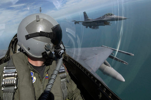 F-16 Fighting Falcons flying over southern Florida Poster Print by Stocktrek Images - Item # VARPSTSTK100134M