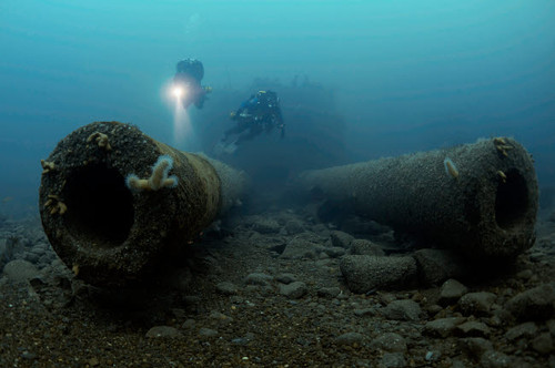 Two divers exploring the HMS Audacious shipwreck Poster Print by Steve Jones/Stocktrek Images - Item # VARPSTSJN400781U
