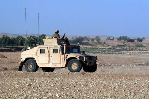 A humvee filled with Marines conducting a mounted combat patrol Poster Print by Stocktrek Images - Item # VARPSTSTK101917M