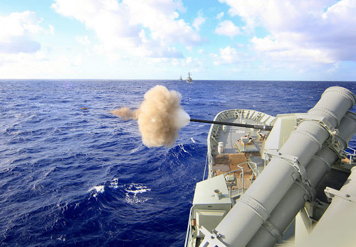 The Australian navy frigate HMAS Warramunga fires its 5-inch gun during a surface engagement Poster Print by Stocktrek Images - Item # VARPSTSTK103790M