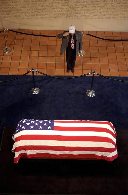 A mourner pays his respects to former President Ronald Reagan Poster Print by Stocktrek Images - Item # VARPSTSTK100537M