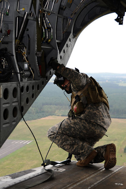 US Army crew chief checks a landing zone from the ramp of an MH-47G Chinook Poster Print by Stocktrek Images - Item # VARPSTSTK108017M US Army crew chief checks a landing zone from the ramp of an MH-47G Chinook Poster Print by Stocktrek Images - Item # VARPSTSTK108017M