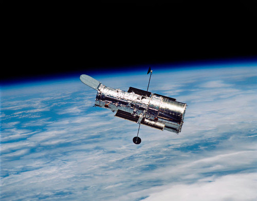 Hubble Space Telescope in orbit around Earth Poster Print by Stocktrek Images - Item # VARPSTSTK201352S