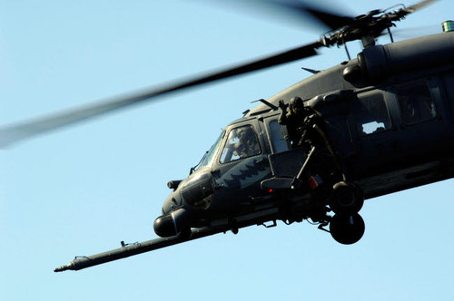 An aerial gunner waves goodbye from an HH-60G Pave Hawk Poster Print by Stocktrek Images - Item # VARPSTSTK102177M