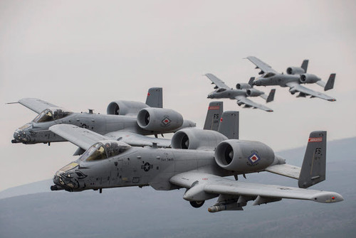 A-10 Thunderbolt II's in flight over Arkansas Poster Print by Stocktrek Images - Item # VARPSTSTK108745M