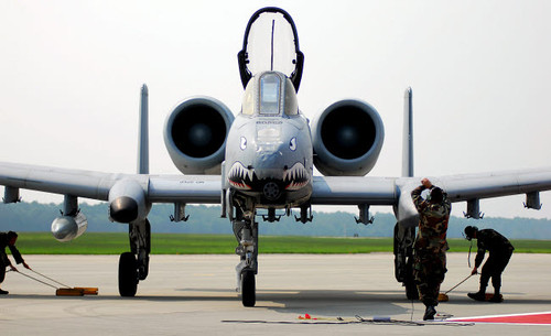 Maintainers place the chocks under an A-10C Thunderbolt II Poster Print by Stocktrek Images - Item # VARPSTSTK102567M