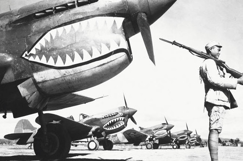 A Chinese soldier guards a line of American P-40 fighter planes during WWII Poster Print by Stocktrek Images - Item # VARPSTSTK106032M