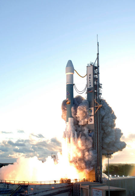 The Delta II rocket lifts off from its launch pad Poster Print by Stocktrek Images - Item # VARPSTSTK202747S