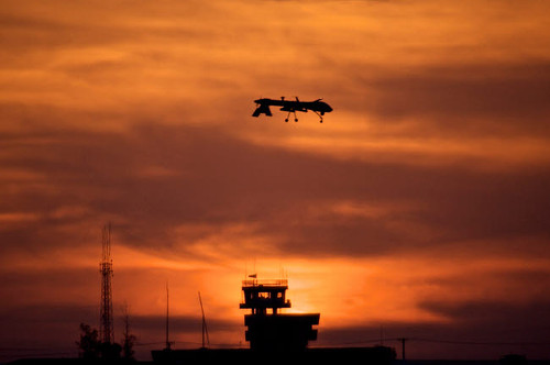 A MQ-1 Predator over COB Speicher at sunset, Tikrit, Iraq Poster Print by Terry Moore/Stocktrek Images - Item # VARPSTTMO100720M