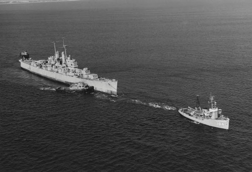 Ex-USS Vincennes is towed out of San Diego Bay, California, by USS Kalmia, 1969 Poster Print by Stocktrek Images - Item # VARPSTSTK500687A