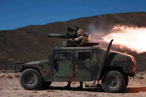 A missileman firing a BGM-71 TOW missile atop a humvee Poster Print by Stocktrek Images - Item # VARPSTSTK104213M A missileman firing a BGM-71 TOW missile atop a humvee Poster Print by Stocktrek Images - Item # VARPSTSTK104213M