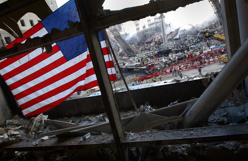 The American Flag is prominent amongst the rubble of what was once the World Trade Center Poster Print by Stocktrek Images - Item # VARPSTSTK104518M
