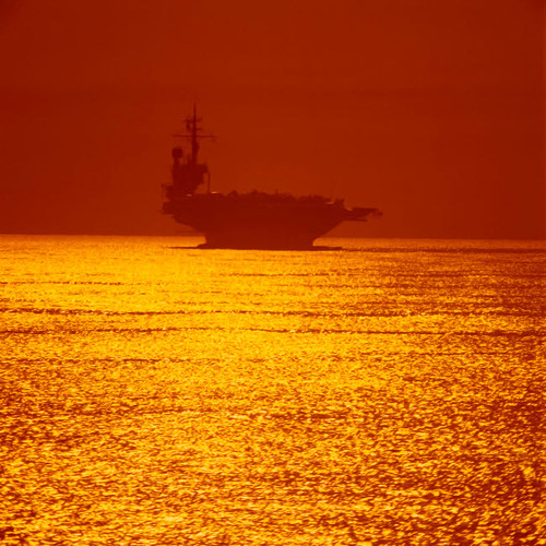 Aircraft carrier at sunset Poster Print by Stocktrek Images - Item # VARPSTSTK100358M