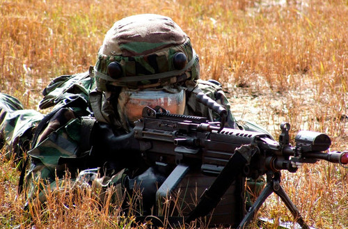 An Airman takes up a firing position Poster Print by Stocktrek Images - Item # VARPSTSTK100181M