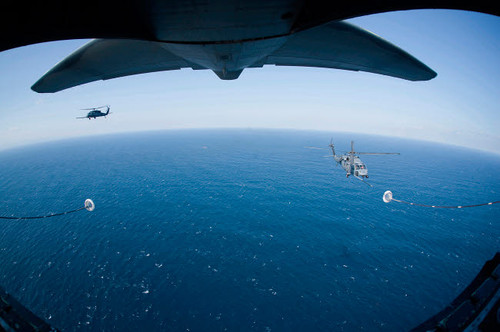 An MC-130P Combat Shadow prepares to refuel two HH-60G Pave Hawk helicopters Poster Print by Stocktrek Images - Item # VARPSTSTK104269M