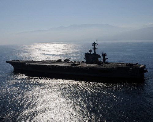 Aircraft carrier USS Carl Vinson awaits the return of aircraft off the coast of Haiti Poster Print by Stocktrek Images - Item # VARPSTSTK103420M