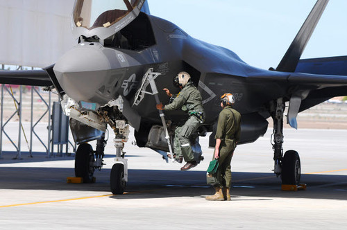A US Marine Corps pilot climbs on an F-35B Lightning II Poster Print by Riccardo Niccoli/Stocktrek Images - Item # VARPSTRCN100409M