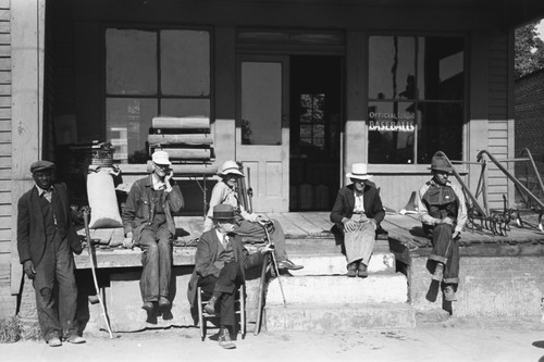 Men in front of store at Irvington, Kentucky Poster Print