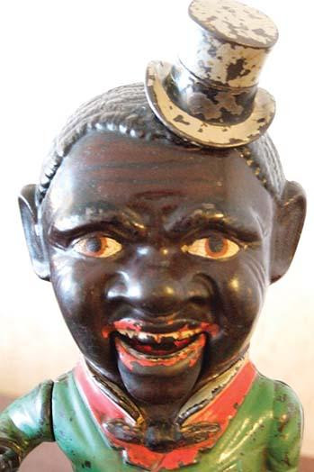 A turn of the century child's toy bank with great facial features. Poster Print by Jason Pierce - Item # VARBLL0587215836