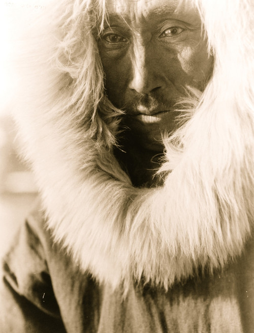 Eskimo man, head-and-shoulders portrait, facing slightly left, wearing fur lined parka. Poster Print - Item # VARBLL058747544L
