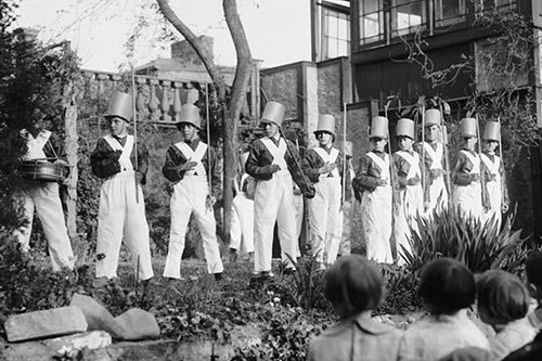Line of Boys pose as Soldiers with inverted pails on their heads Poster Print - Item # VARBLL058746250L