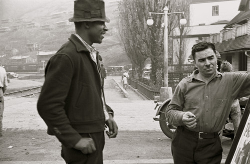 African American and a while man look at a sign Poster Print - Item # VARBLL058744885L
