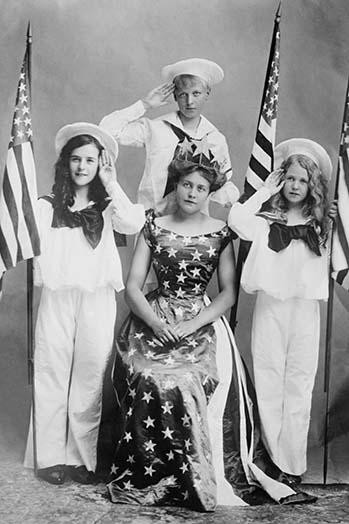 Norma Hornberger, queen of Asbury Park Carnival, surrounded by three saluting children in sailor costumes and holding the American Flag Poster Print - Item # VARBLL058746193L