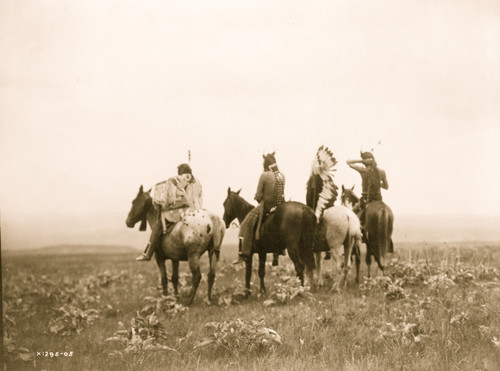 Rear view of four Crow Indians, including Shot in the Hand and Bull Chief, on horseback, Montana. Poster Print - Item # VARBLL058747564L
