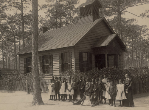 African American school children posed with their teacher outside a school, possibly in South Carolina Poster Print - Item # VARBLL0587631341