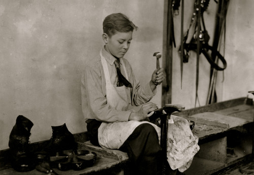 Learning to make shoes. Training School for Deaf Mutes Poster Print