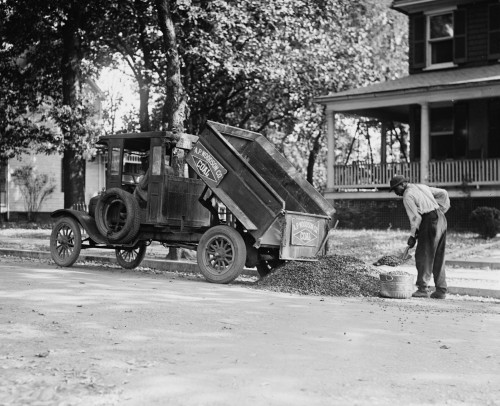Heating Coal Being shoveled from a Ford Dump Truck; African American Worker loads a large Tub with which to convey it to the Home Poster Print - Item # VARBLL058746318L