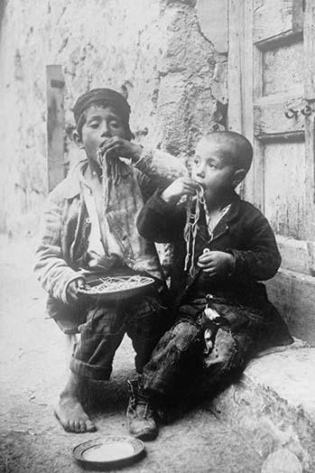 Two Neapolitan Children slurp down Spaghetti Poster Print by unknown - Item # VARBLL058745747L