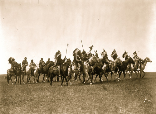 Brul? Indians, many wearing war bonnets, on horseback. Poster Print - Item # VARBLL058746841L