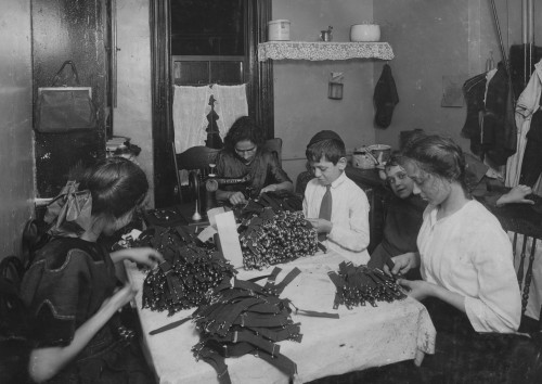 Jewish family working on garters in kitchen for tenement home Poster Print - Item # VARBLL058754557L